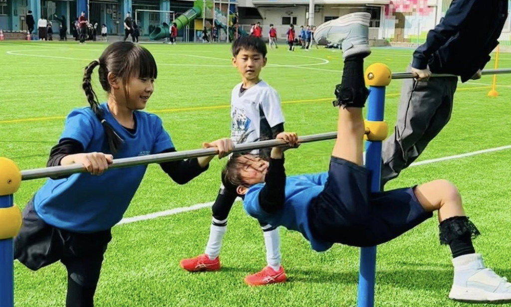 Students playing on the field at OWIS Osaka