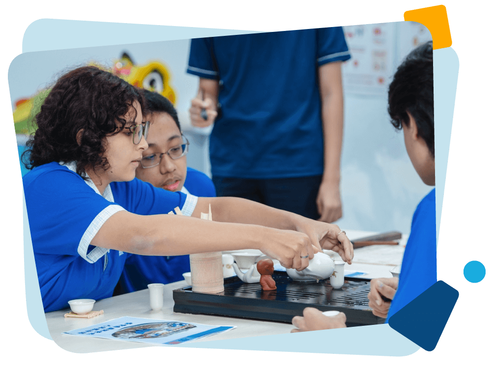 Primary school students are working together at OWIS Osaka