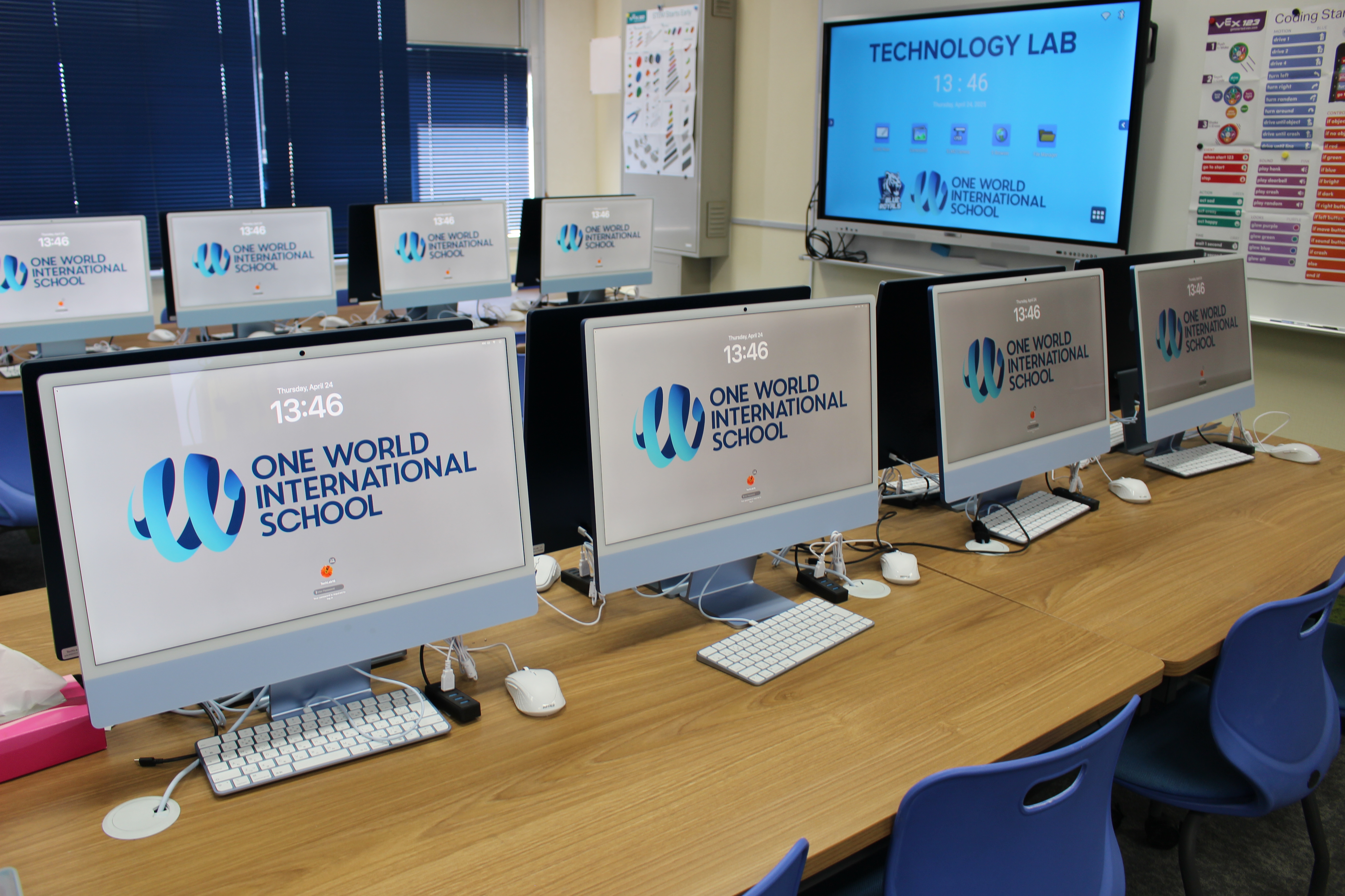 Information Technology (IT) Lab at One World International School Osaka, showing computer screens Information Technology (IT) Lab at One World International School Osaka, showing computer screens