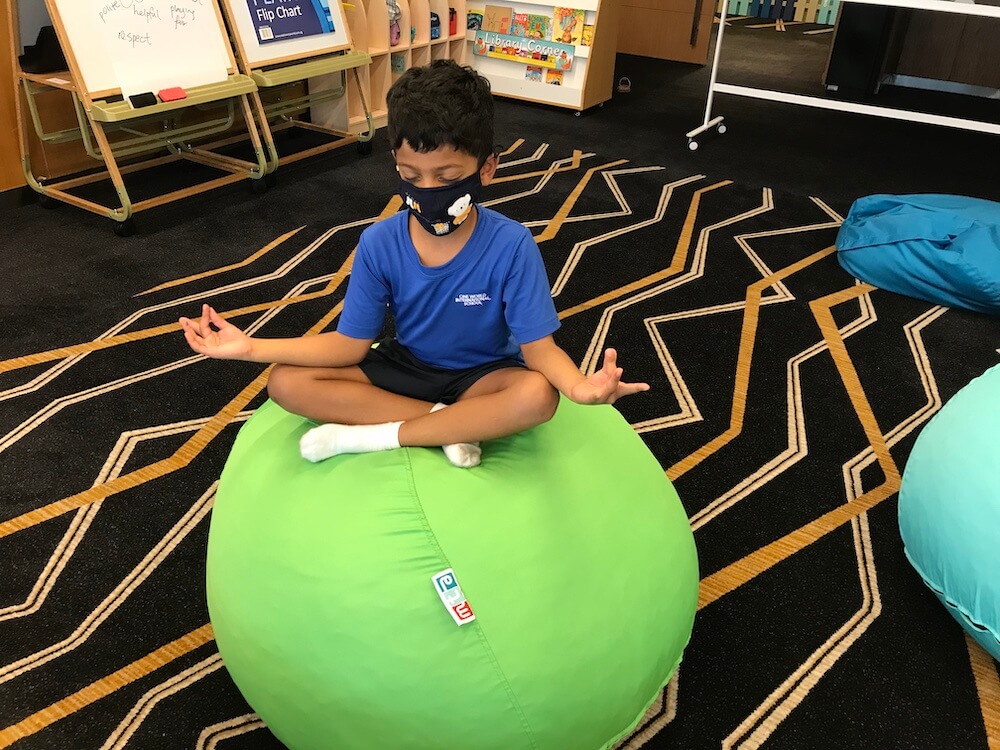 OWIS Suntec student practising mindfulness