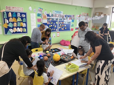 Photograph capturing the enthusiasm of OWIS Nanyang Primary students as they delve into the IBPYP curriculum, focusing on the exploration of space