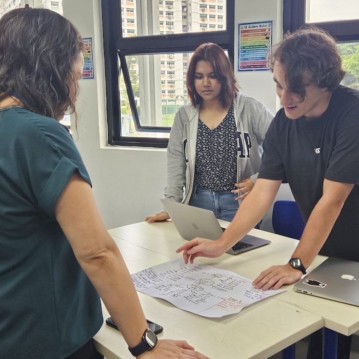 IBDP students at OWIS Nanyang give French lessons to staff | International School in Jurong