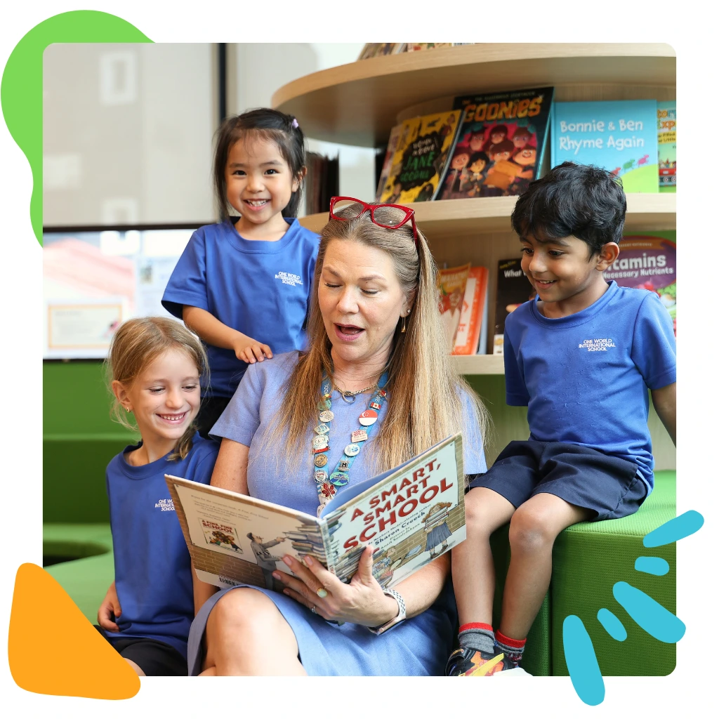 angela the head of school reading to children at owis newton in singapore